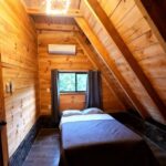 recamara de cabaña alpina AG